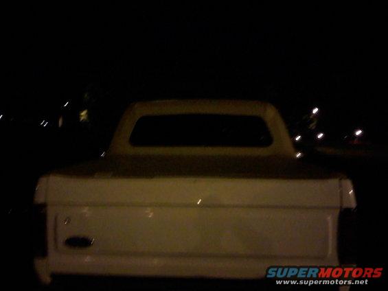 White 1996 Ford Bronco rear view with soft top