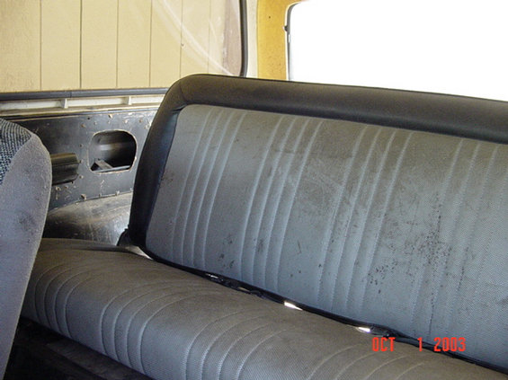 Backseat is dirty, side panels have holes