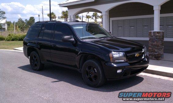 Black 2008 Chevrolet TrailBlazer parked in front of mailboxes