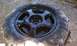 2008 Chevrolet TrailBlazer - Car wheel and tire covered in plastic wrap, ready for painting.