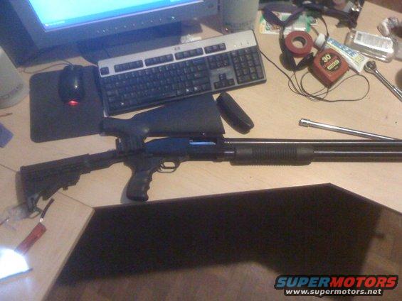 Tactical shotgun with scope and adjustable stock