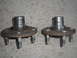 1995 Ford Thunderbird - Two front wheel hubs are shown, likely for a vehicle part replacement.