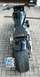 1995 Harley-Davidson Fat Boy - Motorcycle rear view shows a wide tire and custom seat. License plate is visible.