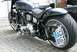 1995 Harley-Davidson Fat Boy - A black motorcycle is shown from the rear, a custom seat and a German license plate.