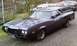 1972 Ford Ranchero - This 1972 Ford Ranchero, equipped with a camper shell, is viewed from a three-quarter front angle on a paved surface.