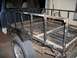 1994 Ford Explorer - Rear view of a pickup truck bed modified with a custom metal rack structure.