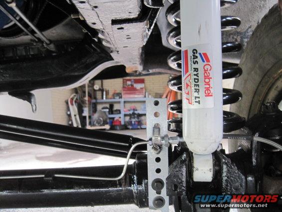 Close-up of Gabriel Gas Ryder LT shock absorber and suspension parts on a vehicle's undercarriage