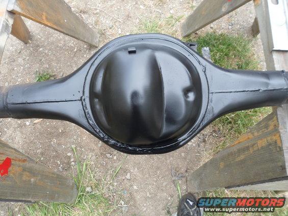 Black rear axle differential assembly on sawhorses