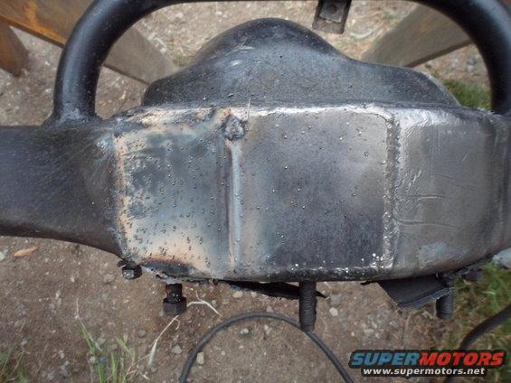 Rear axle differential with visible welds and bolts