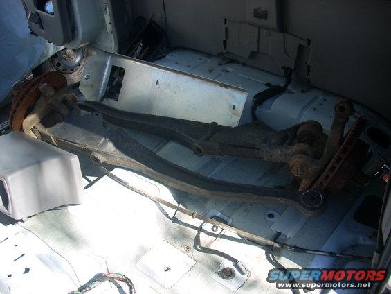 Suspension parts inside a vehicle's cargo area