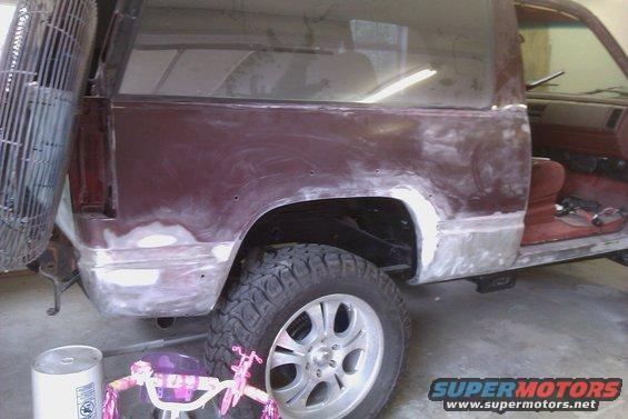 Maroon 1994 Chevrolet Blazer side view, showing bodywork and primer