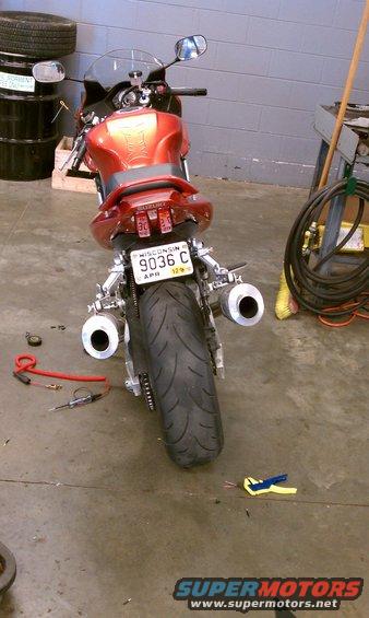 2003 Suzuki SV1000S motorcycle rear view with Wisconsin license plate 9036 C