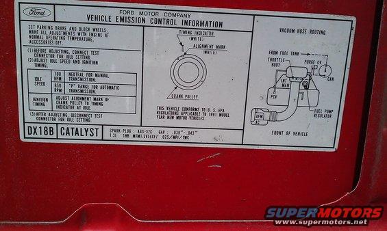 Ford Motor Company vehicle emission control information sticker with diagrams and text