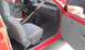 1991 Ford Festiva - Interior view of a 1991 Ford Festiva, highlighting the seats and dashboard.