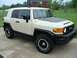 2010 Toyota FJ Cruiser - This Toyota FJ Cruiser is seen from a 3/4 front angle, showing its distinctive body style and roof rack.
