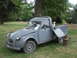 1977 Pontiac Trans Am - This vintage Citroën 2CV pickup truck is parked on a grassy lawn with a decorative duck in its cargo bed.