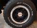 2010 Toyota FJ Cruiser - Close-up of a TRD wheel and BFGoodrich All-Terrain T/A tires on a vehicle.