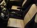 2010 Toyota FJ Cruiser - The interior of a Toyota FJ Cruiser shows two-tone seats and the center console with an automatic transmission shifter.