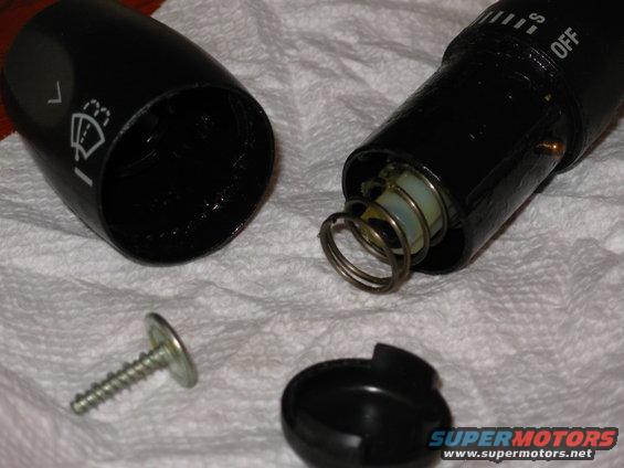 17screw.jpg As the collar comes off, watch for the detent pins & spring to fall out (the brass pin near the word &quot;OFF&quot;).