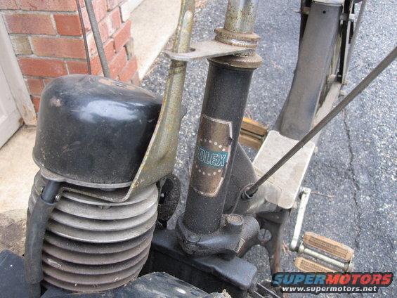 Close-up of moped engine and handlebars with SOLEX badge