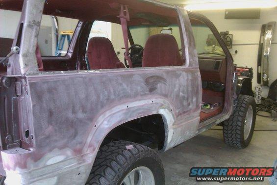 Maroon 1994 Chevrolet Blazer with bodywork, showing interior and rear quarter panel