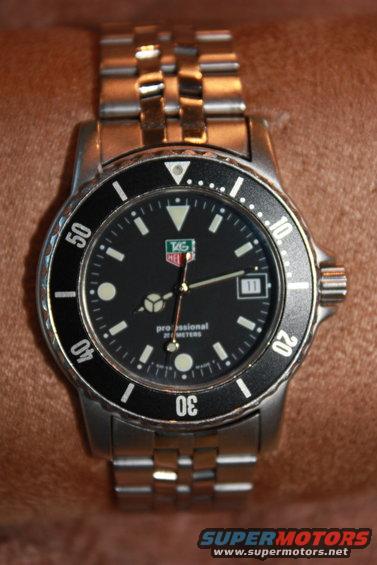 TAG Heuer Professional watch with black dial and date window
