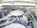 1985 Ford F-250 - Close-up view of a vehicle's engine bay, showing various components and wiring.