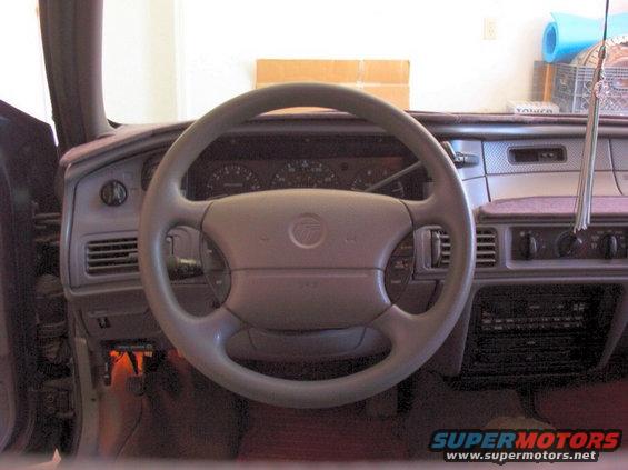 dash3.jpg Another straight-on view of the dash. You can see my tassle on the rearview mirror.