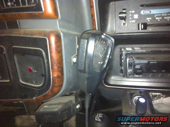 1990 Ford Bronco interior showing CB radio, Kenwood stereo, and 4x4 shifter