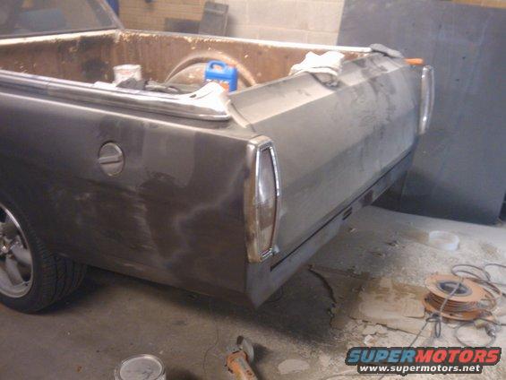 1969 Ford Ranchero rear quarter panel with chrome trim and fuel door