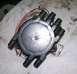 1995 Ford Probe - A distributor cap with multiple wires and numbered ports is shown.