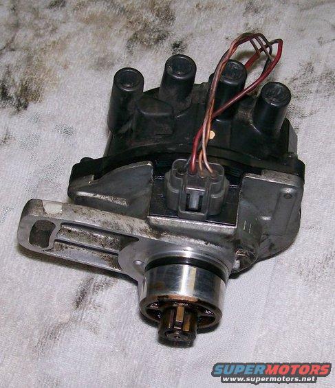 Automotive distributor cap with wires and rotor assembly