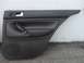 2001 Volkswagen Jetta - This is a car door panel, likely from a Volkswagen, with a speaker and window crank visible.