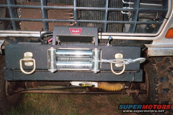 1978 Ford Bronco front bumper with WARN winch and yellow shock absorber