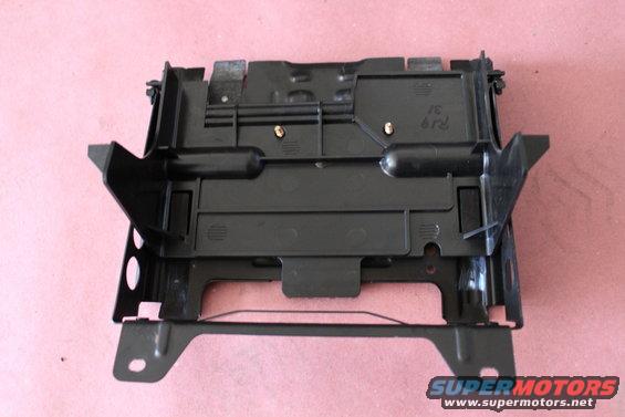 Black plastic part with visible text '76 6rd'