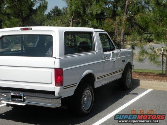White 1996 Ford Bronco rear quarter view