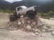 1986 Ford Bronco - Modified pickup truck navigating a rocky terrain.