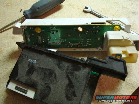 Car stereo circuit board and housing with visible text