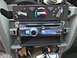 2002 Toyota 4Runner - JVC stereo installed in a vehicle's dashboard, alongside climate control knobs.
