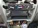 2002 Toyota 4Runner - Interior view of a car's dashboard with climate controls and an aftermarket stereo installation area.