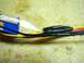 2002 Toyota 4Runner - A utility knife is used to strip wires on a harness that is being prepared for a JVC stereo installation.
