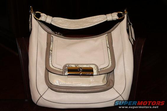 coach-2.jpg This is what I had to buy my wife to get permission to buy the Katzkins for the Vic.