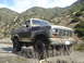 1986 Ford Bronco - This Ford Bronco appears to be from the early 1980s, not 1986, and is shown off-road.