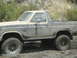 1986 Ford Bronco - This 1986 Ford Bronco is deep in the mud during an off-road excursion.