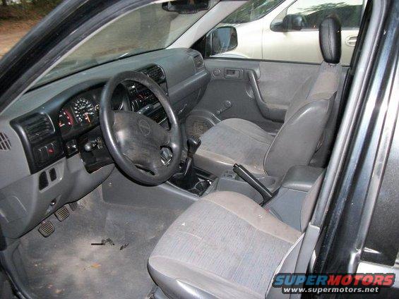 1993 Isuzu Rodeo interior showing dashboard, steering wheel, seats, and center console