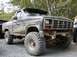 1985 Ford F-150 - First time out wheeling the solid axle,I have to break out the sawzall on the fenders,it flexed pretty good!!