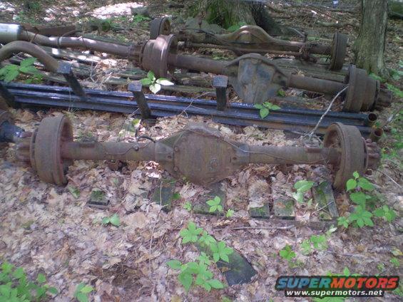 Rusty rear axles with drums in woods