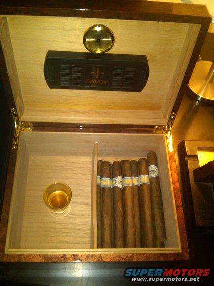 Humidor with cigars and a shot glass, Savoy humidifier