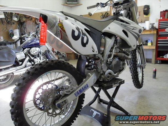 White Yamaha dirt bike with number 36 on side, 3q-front view