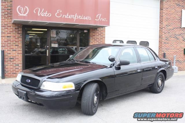 Black 2005 Ford Crown Victoria parked in front of Veto Enterprises Inc